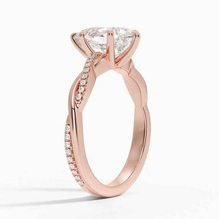 1.50 Ct Pear Cut Moissanite Twisted Engagement Ring in Rose Gold