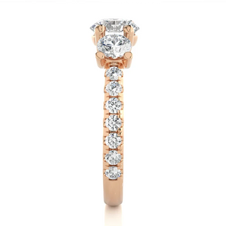 2.50 Carat Round Moissanite Trellis Prong Three Stone Engagement Ring in Rose Gold