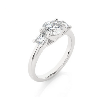 Angled view of 2 Carat Round Moissanite Three Stone Engagement Ring in Silver, showcasing the band and setting.