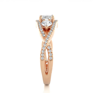 1.50 Carat Round Moissanite Three Stone Twisted Engagement Ring in Rose Gold