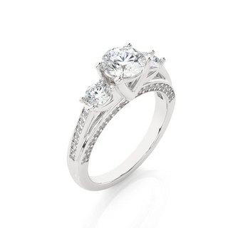 Angled view of 2 Carat Moissanite Three Stone Engagement Ring With Accents in Silver, showcasing the band and setting.