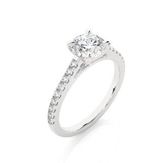 Angled view of 1.20 Ct Round Cut Moissanite Cathedral Set Engagement Ring In White Gold, showcasing the band and setting.