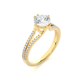 Angled view of 1.40 Ct Round Cut Moissanite Split Shank Engagement Ring In Yellow Gold, showcasing the band and setting.