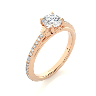 Angled view of 1.50 Ct Round Cut Moissanite French V-Split Engagement Ring In Rose Gold, showcasing the band and setting.