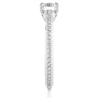 Side profile of Front view of 1.50 Ct Round Cut Moissanite French V-Split Engagement Ring In Silver, highlighting the brilliant center moissanite stone., highlighting the prong setting.