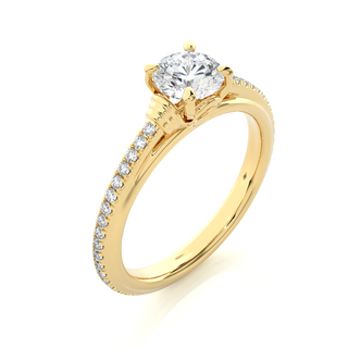Angled view of 1.50 Ct Round Cut Moissanite French V-Split Engagement Ring In Yellow Gold, showcasing the band and setting.