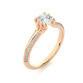 Angled view of 1.50 Ct Round Cut Moissanite Two Row Accent Engagement Ring In Rose Gold, showcasing the band and setting.