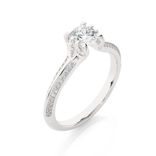 Angled view of 1.50 Ct Round Cut Moissanite Two Row Accent Engagement Ring In White Gold, showcasing the band and setting.