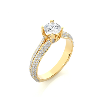 Angled view of 1.50 Ct Round Moissanite Split Shank Engagement Ring In Yellow Gold, showcasing the band and setting.