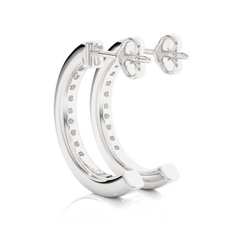 angled view of 1 Carat Round Shape Moissanite C-Hoop Earrings In White Gold, with bright sparkle in channel setting.