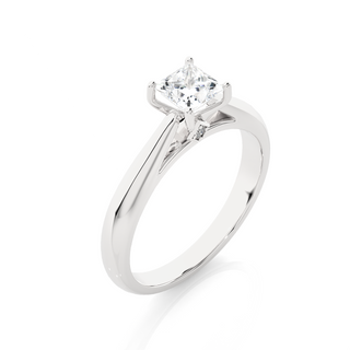 Angled view of 1 Ct Princess Moissanite Solitaire Engagement Ring In White Gold, showcasing the band and setting.