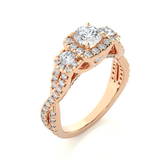 Angled view of 2.50 Ct Round Moissanite Three Stone Halo Engagement Ring In Rose Gold, showcasing the band and setting.