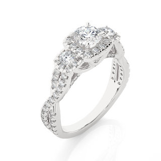 Angled view of 2.50 Ct Round Moissanite Three Stone Halo Engagement Ring In Silver, showcasing the band and setting.