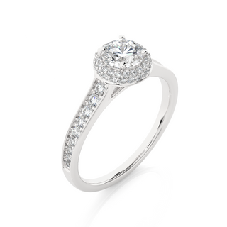 Angled view of 2 Ct Round Cut Moissanite Halo Engagement Ring In White Gold, showcasing the band and setting.