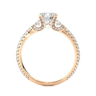 Side profile of 1 Carat Round Shaped Moissanite Engagement Ring With Accents in Rose Gold, highlighting the prong setting.