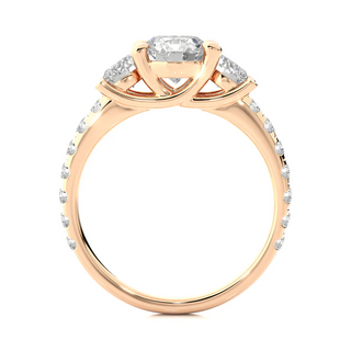 Side profile of 2.50 Carat Round Moissanite Trellis Prong Three Stone Engagement Ring in Rose Gold, highlighting the prong setting.