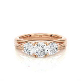 Front view of 2 Carat 3 Stone Round Cut Moissanite Ring in Rose Gold, highlighting the brilliant center moissanite stone.