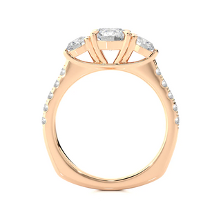 Side profile of 2 Carat Round Moissanite Engagement Three Stone Ring In Rose Gold, highlighting the prong setting.