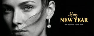 Close-up of a woman's face with a diamond earring, 'Happy New Year' text on a black background