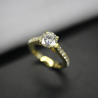 1.50 Ct Round Cut Moissanite Ring With Accent in Yellow Gold