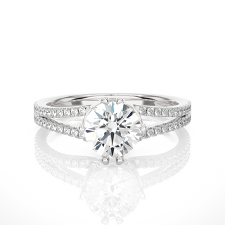 Front view of 1.40 Ct Round Cut Moissanite Split Shank Engagement Ring In White Gold, highlighting the brilliant center moissanite stone.