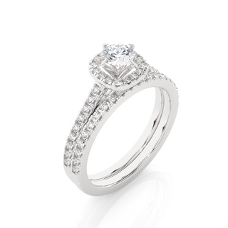 Angled view of 1.50 Carat Halo Moissanite Bridal Set With Accents in Silver, showcasing the band and setting.​