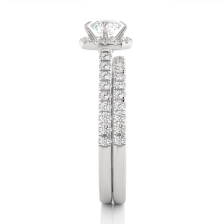 Side profile of 1.50 Carat Halo Moissanite Bridal Set With Accents in Silver, highlighting the brilliant center moissanite stone., highlighting the prong setting.