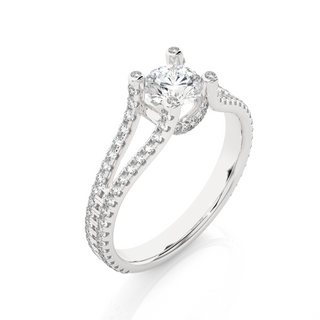 Angled view of 1.50 Carat Moissanite Split Shank Engagement Ring With Accents In White Gold, showcasing the band and setting.​