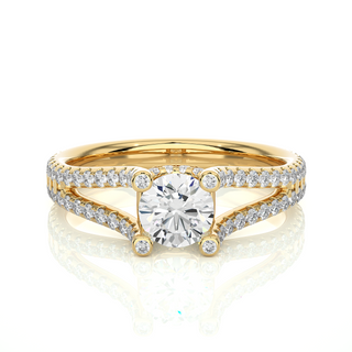 Front view of 1.50 Carat Moissanite Split Shank Engagement Ring With Accents In Yellow Gold, highlighting the brilliant center moissanite stone.