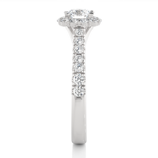 Side profile of 1.50 Carat Round Moissanite Halo Engagement Ring In Silver, highlighting the brilliant center moissanite stone., highlighting the prong setting.