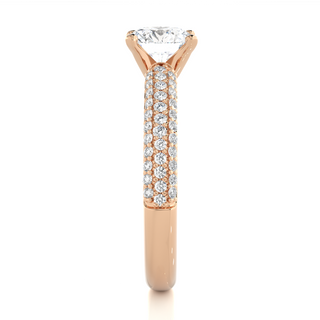 Side profile of 1.50 Ct Moissanite Engagement Ring With Three Row Accents In Rose Gold, highlighting the prong setting.
