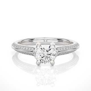 Front view of 1.50 Ct Round Cut Moissanite Two Row Accent Engagement Ring In White Gold, highlighting the brilliant center moissanite stone.