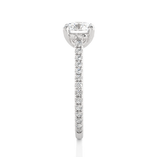 Side profile of 1.50 Ct Round Moissanite Hidden Halo Engagement Ring In Silver, highlighting the brilliant center moissanite stone., highlighting the prong setting.