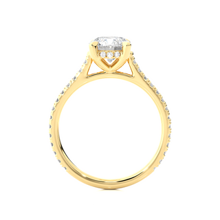 Side profile of 1.50 Ct Round Moissanite Hidden Halo Engagement Ring In Yellow Gold, highlighting the brilliant center moissanite stone., highlighting the prong setting.