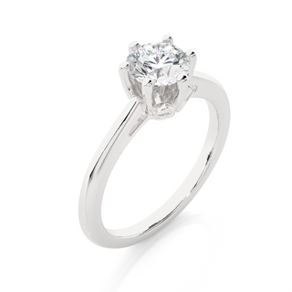 Angled view of 1.50 Ct Round Moissanite Solitaire Engagement Ring In Silver, showcasing the band and setting.​