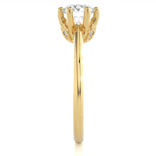Side profile of 1.50 Ct Round Moissanite Solitaire Engagement Ring In Yellow Gold, highlighting the prong setting.