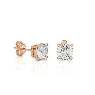 Side view of 1 Carat Four Prong Round Cut Moissanite Stud Earrings in Rose Gold, highlighting prong height and earring profile.