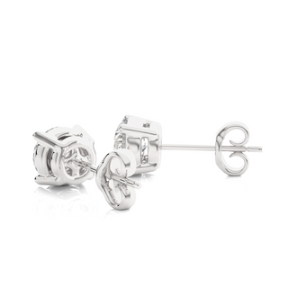 Angled view of 1 Carat Four Prong Round Cut Moissanite Stud Earrings in White Gold, showing depth and radiant sparkle.