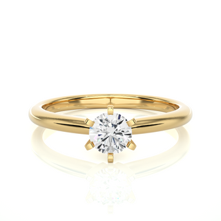  front view of 1 Carat Round Cut Solitaire Moissanite Ring in Yellow Gold highlights the brilliant center moissanite stone.