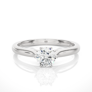 Front view of 1 Carat Round Moissanite Solitaire Engagement Ring In White Gold, highlighting the brilliant center moissanite stone.