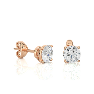 Side view of 1 Ct Basket Set Moissanite Stud Earrings In Rose Gold, highlighting prong height and earring profile.