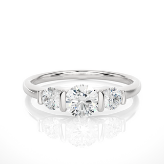 Front view of 2 Carat Round Cut Moissanite Three Stone Engagement Ring In Silver, highlighting the brilliant center Moissanite stone.