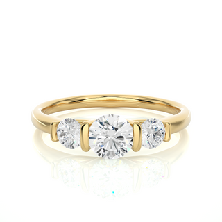 Front view of 2 Carat Round Cut Moissanite Three Stone Engagement Ring In Yellow Gold, highlighting the brilliant center Moissanite stone.